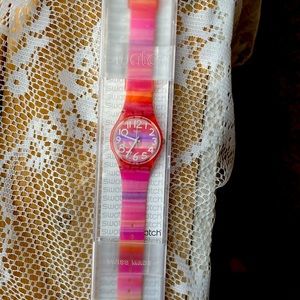 Swatch Watch, striped pink and other pastel colors
